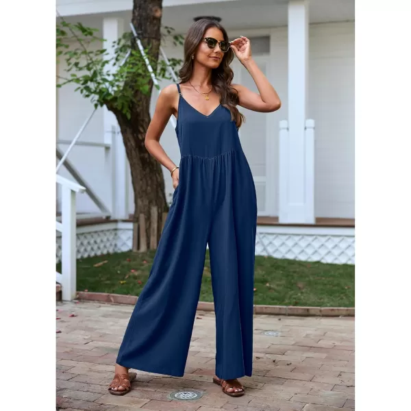 imageluvamia Wide Leg Jumpsuits for Women Sleeveless Baggy Casual Summer Flowy Loose Spaghetti Strap Jumpsuit with PocketsNavy Blue