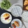 imageGibson Home Oslo Porcelain Chip and Scratch Resistant Dinnerware Set Service for 4 16pcs Plates and Bowls Dishes Sets WhiteWhite  Blue Decorated