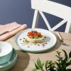 imageSur La Table Kitchen Essentials 16 Piece TwoTone Porcelain Chip and Scratch Resistant Dinnerware Plates and Bowls Set  RedWhiteGreenWhite