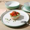 imageSur La Table Kitchen Essentials 16 Piece TwoTone Porcelain Chip and Scratch Resistant Dinnerware Plates and Bowls Set  RedWhiteGreenWhite