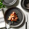 imageSur La Table Kitchen Essentials Banquette 16 Piece Double Bowl Plates and Bowls Reactive Glaze Stoneware Dinnerware Set  GreenBlack