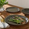 imageGibson Elite Capetown Assorted Color Reactive Glaze Round Stoneware Dinnerware Black Yellow Orange Green Service for Four 12pcsDark Green