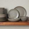 imageGibson Elite Island Cove 16 Piece Service for 4 Plates and Bowls Reactive Glaze Organic Round Dishes Stoneware Ceramic Dinnerware Set GreenBeckett Grey