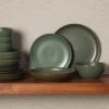 imageGibson Elite Island Cove 16 Piece Service for 4 Plates and Bowls Reactive Glaze Organic Round Dishes Stoneware Ceramic Dinnerware Set GreenBeckett Green