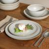 imageGibson Elite Island Cove 16 Piece Service for 4 Plates and Bowls Reactive Glaze Organic Round Dishes Stoneware Ceramic Dinnerware Set GreenBeckett Linen White