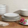 imageGibson Elite Island Cove 16 Piece Service for 4 Plates and Bowls Reactive Glaze Organic Round Dishes Stoneware Ceramic Dinnerware Set GreenBeckett Linen White