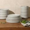 imageGibson Elite Island Cove 16 Piece Service for 4 Plates and Bowls Reactive Glaze Organic Round Dishes Stoneware Ceramic Dinnerware Set GreenGelston Cream