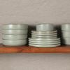 imageGibson Elite Island Cove 16 Piece Service for 4 Plates and Bowls Reactive Glaze Organic Round Dishes Stoneware Ceramic Dinnerware Set GreenGelston Green