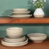 imageGibson Elite Island Cove 16 Piece Service for 4 Plates and Bowls Reactive Glaze Organic Round Dishes Stoneware Ceramic Dinnerware Set GreenLight Grey