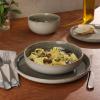 imageGibson Elite Sunveil 16 Piece Service for 4 Plates and Bowls Reactive Glaze Round Dishes Stoneware Ceramic Dinnerware Set BlueSunveil Taupe