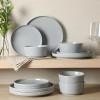 image:imageGibson Home Dempsey Road 12Piece Stoneware Dinnerware Set  Service for 4 Round Black Plates and Bowls Durable Solid Color Modern Embossed Dish Set Microwave amp Dishwasher SafeGrey Dempsey Road