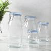 image:imageSur La Table Lyon Court 4Piece Glass Canister Set with Airtight Trigger Clamp Lids Clear  71 oz 54 oz 37 oz amp 225 oz Sizes Rubber Gasket Seal Dishwasher Safe Food Storage JarsSet of 4 71 oz  54 oz  37 oz  225 oz