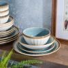 image:imageGibson Elite Bayou Moon Plates and Bowls Sets 16Piece White Matte Stoneware Dinnerware Sets Solid Color Reactive Glaze Dish SetLight Blue Mayfair Bay