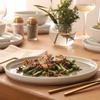 image:imageGibson Elite Island Bay 12Piece New Bone China Dinnerware Set Service for 4 Reactive Glaze Plates and Bowls Dishwasher and Microwave Safe Black and CreamGrey Tahoe Sunset