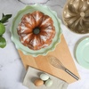 image:imageMartha Stewart Dunelle Decorative Fluted Cast Aluminun Round Cake Pan  10Cup Nonstick Tube Pan Champagne Gold BakewareChampagne Gold