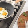 image:imageSur La Table Kitchen Essential Main Canteen 95 PreSeasoned Cast Iron Skillet wWood Handle Natural Nonstick Lightweight Frying Pan for Searing Sauting amp Everyday Cooking  BlueEggshell White Skillet