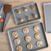 image:imageSur La Table Kitchen Essentials Bake Sale 3Piece Cookie Sheet Set  Nonstick Carbon Steel Baking Pans 13 15 18 Inch  Grey EasyClean Oven Trays for Cookies Roasting amp MoreLinen White