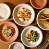image:imageBloomhouse  Two Time Oprahs Favorite Things Winner  Corsica Clay 12 Piece Stoneware Rustic Reactive Glaze Dinnerware Set  Stackable Plates and Bowls Set Service for 4  Matte Sea Salt WhiteAssorted Colors