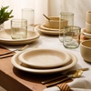 image:imageBloomhouse  Two Time Oprahs Favorite Things Winner  Corsica Clay 12 Piece Stoneware Rustic Reactive Glaze Dinnerware Set  Stackable Plates and Bowls Set Service for 4  Matte Sea Salt WhiteCappuccino Cream