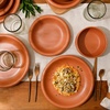 image:imageBloomhouse  Two Time Oprahs Favorite Things Winner  Corsica Clay 12 Piece Stoneware Rustic Reactive Glaze Dinnerware Set  Stackable Plates and Bowls Set Service for 4  Matte Sea Salt WhiteBurnt Apricot Terracotta