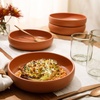 image:imageBloomhouse  Two Time Oprahs Favorite Things Winner  Corsica Clay 12 Piece Stoneware Rustic Reactive Glaze Dinnerware Set  Stackable Plates and Bowls Set Service for 4  Matte Sea Salt WhiteBurnt Apricot Terracotta