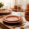 image:imageBloomhouse  Two Time Oprahs Favorite Things Winner  Corsica Clay 12 Piece Stoneware Rustic Reactive Glaze Dinnerware Set  Stackable Plates and Bowls Set Service for 4  Matte Sea Salt WhiteBurnt Apricot Terracotta