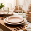 image:imageBloomhouse  Two Time Oprahs Favorite Things Winner  Corsica Clay 12 Piece Stoneware Rustic Reactive Glaze Dinnerware Set  Stackable Plates and Bowls Set Service for 4  Matte Sea Salt WhiteProsecco Blush Pink