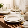 image:imageBloomhouse  Two Time Oprahs Favorite Things Winner  Corsica Clay 12 Piece Stoneware Rustic Reactive Glaze Dinnerware Set  Stackable Plates and Bowls Set Service for 4  Matte Sea Salt WhiteSea Salt White