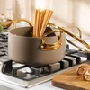 image:imageBloomhouse 15Piece Ceramic Nonstick Cookware Set Two Time Oprahs Favorite Things HeavyGauge Aluminum Pots and Pans Set PFAS amp PFOA amp PTFE Free Ceramic Cookware Oven Safe to 500F CappuccinoCappuccino Cream w Gold Handle