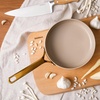 image:imageBloomhouse 15Piece Ceramic Nonstick Cookware Set Two Time Oprahs Favorite Things HeavyGauge Aluminum Pots and Pans Set PFAS amp PFOA amp PTFE Free Ceramic Cookware Oven Safe to 500F CappuccinoAlmond Cream w Gold Handle