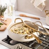 image:imageBloomhouse 15Piece Ceramic Nonstick Cookware Set Two Time Oprahs Favorite Things HeavyGauge Aluminum Pots and Pans Set PFAS amp PFOA amp PTFE Free Ceramic Cookware Oven Safe to 500F CappuccinoAlmond Cream w Gold Handle