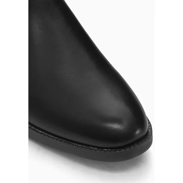Coutgo Men's Casual Chelsea Boots Leather Steel Toe Low Heel Elastic Slip-on Dress Shoes