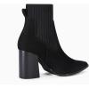 imageCoutgo Women Ankle Boots Sock Booties Pointed Toe Chunky Stacked High Heel Knit Chelsea Winter Dress BootiesCool Black