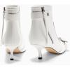 imageCoutgo Womens Kitten Heel Ankle Boots Pointed Toe Buckle Side Zipper Tassel Fall Winter Booties ShoesCreamywhite