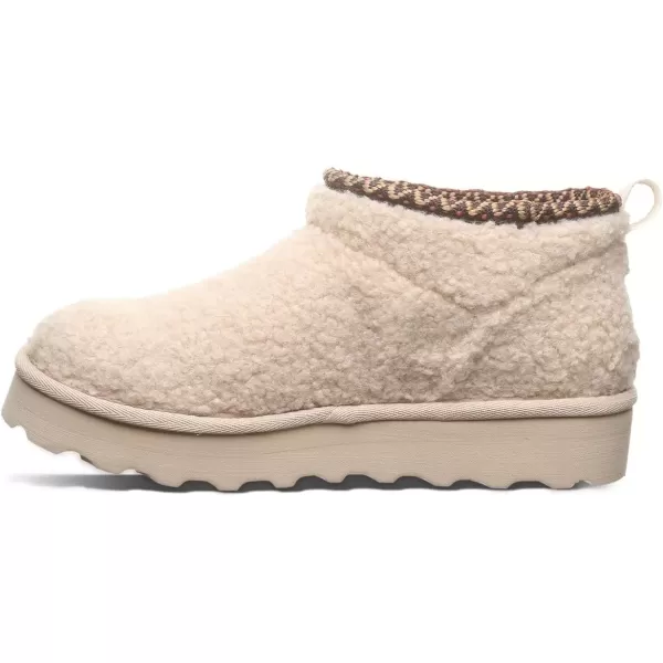 imageBEARPAW Womens Snuggle Daphne Deco Boot  Womens Ankle Boot  Womens Slip On Boot  Comfortable Winter BootOat