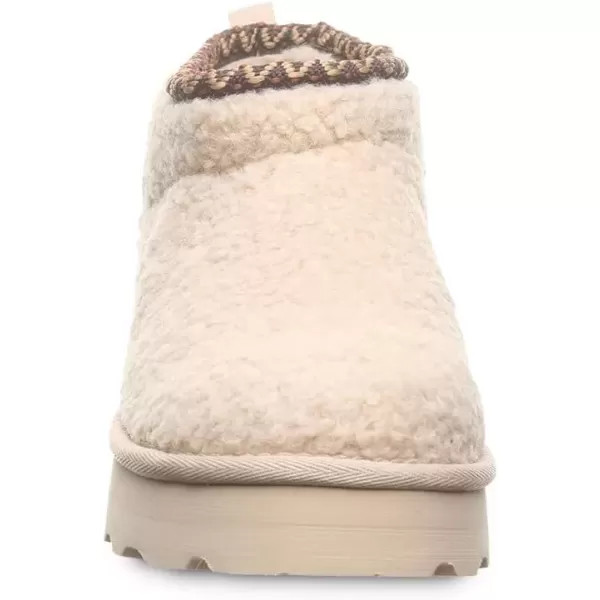 imageBEARPAW Womens Snuggle Daphne Deco Boot  Womens Ankle Boot  Womens Slip On Boot  Comfortable Winter BootOat