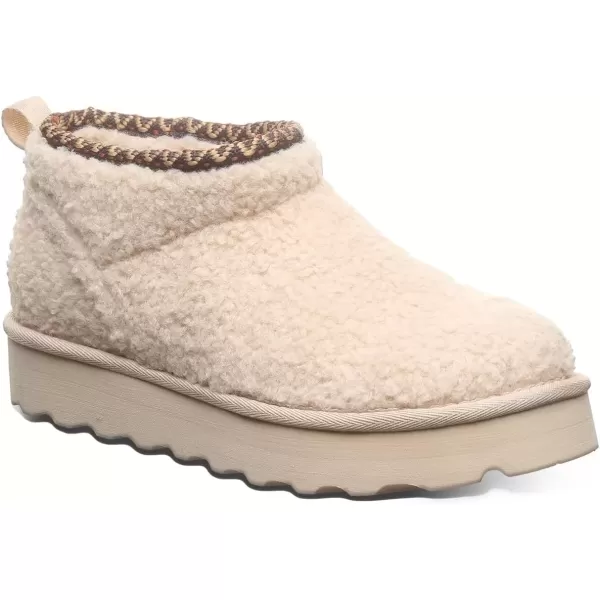 imageBEARPAW Womens Snuggle Daphne Deco Boot  Womens Ankle Boot  Womens Slip On Boot  Comfortable Winter BootOat