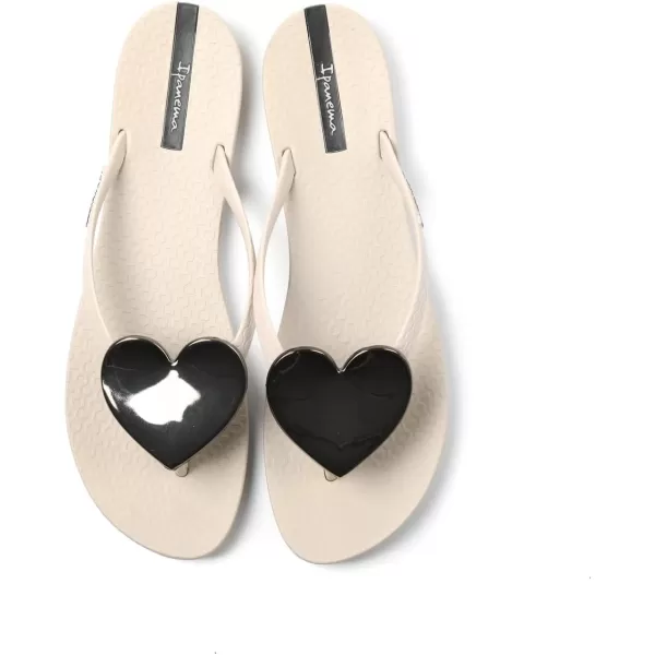 imageIpanema Womens Wave Heart Flip Flop  Comfortable amp Stylish Summer Sandal with Metallic Heart Embellishment Anatomic Footbed amp NonSlip SoleBeigeBlack