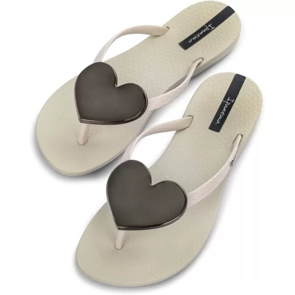 imageIpanema Womens Wave Heart Flip Flop  Comfortable amp Stylish Summer Sandal with Metallic Heart Embellishment Anatomic Footbed amp NonSlip SoleBeigeBlack