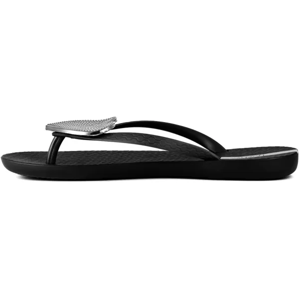 imageIpanema Womens Wave Heart Flip Flop  Comfortable amp Stylish Summer Sandal with Metallic Heart Embellishment Anatomic Footbed amp NonSlip SoleBlackSilver