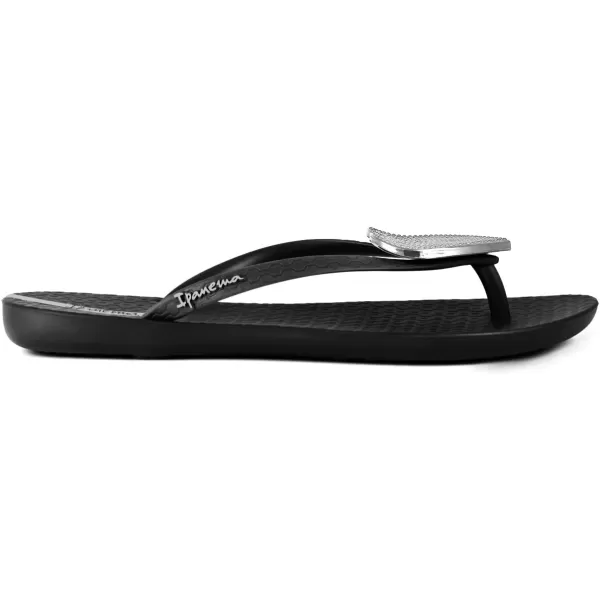 imageIpanema Womens Wave Heart Flip Flop  Comfortable amp Stylish Summer Sandal with Metallic Heart Embellishment Anatomic Footbed amp NonSlip SoleBlackSilver