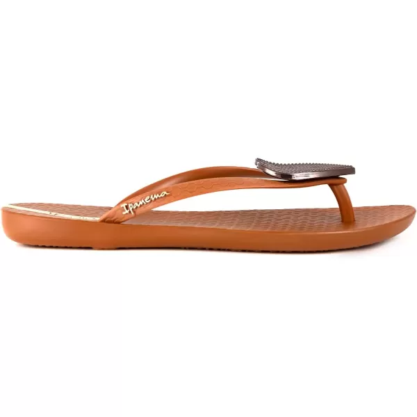 imageIpanema Womens Wave Heart Flip Flop  Comfortable amp Stylish Summer Sandal with Metallic Heart Embellishment Anatomic Footbed amp NonSlip SoleBrownBronze