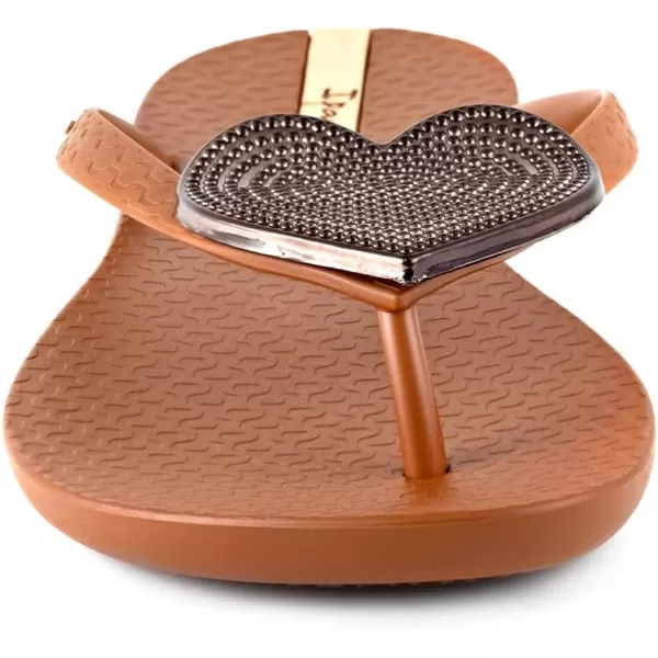 imageIpanema Womens Wave Heart Flip Flop  Comfortable amp Stylish Summer Sandal with Metallic Heart Embellishment Anatomic Footbed amp NonSlip SoleBrownBronze