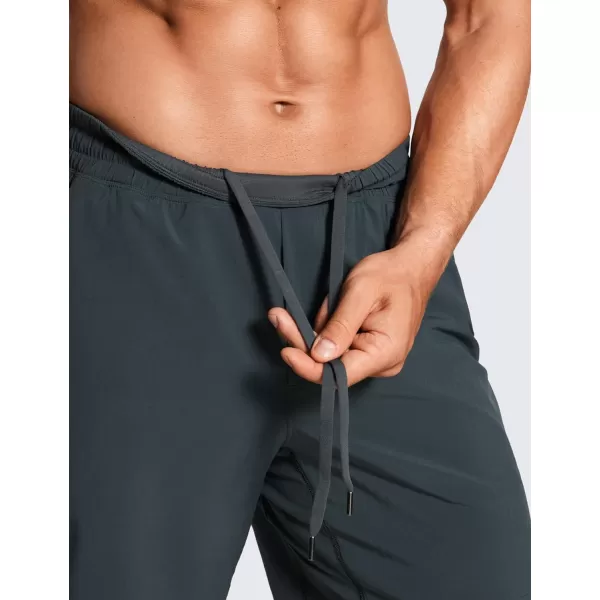 CRZ YOGA Mens 2 in 1 Running Shorts with Liner  7 Quick Dry Workout Sports Athletic Shorts with PocketsMelanite