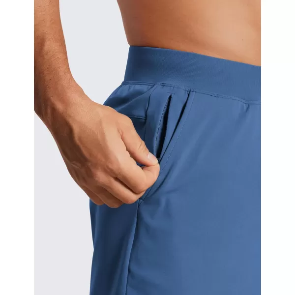 CRZ YOGA Mens FourWay Stretch Workout Shorts  5 Soft Durable Casual Athletic Shorts with Pocket Gym Running HikingPitch Blue