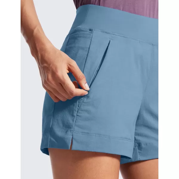 CRZ YOGA Womens Lightweight Mid Rise Hiking Shorts 4  Stretch Athletic Summer Travel Outdoor Golf Shorts Zip PocketsUniverse Blue