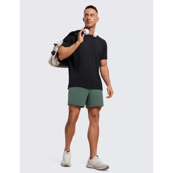 CRZ YOGA Mens FourWay Stretch Workout Shorts  5 Soft Durable Casual Athletic Shorts with Pocket Gym Running HikingDark Forest Green