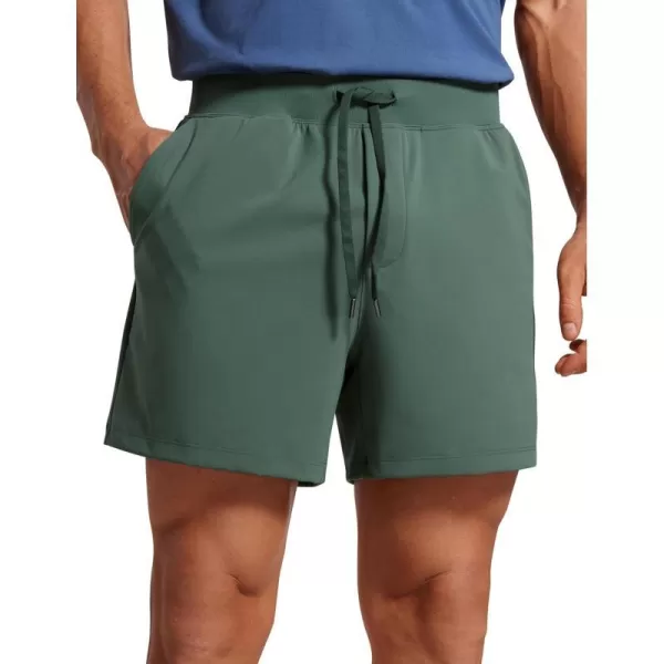 CRZ YOGA Mens FourWay Stretch Workout Shorts  5 Soft Durable Casual Athletic Shorts with Pocket Gym Running HikingDark Forest Green