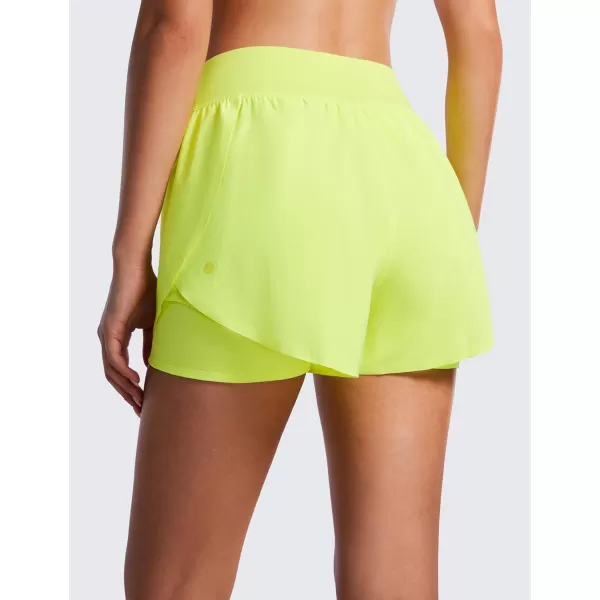 CRZ YOGA 2 in 1 Dolphin Running Shorts for Women High Waisted Gym Workot Athletic Tennis Shorts with Pockets SplitNeon Yellow