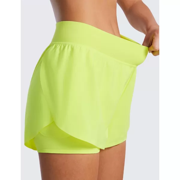 CRZ YOGA 2 in 1 Dolphin Running Shorts for Women High Waisted Gym Workot Athletic Tennis Shorts with Pockets SplitNeon Yellow